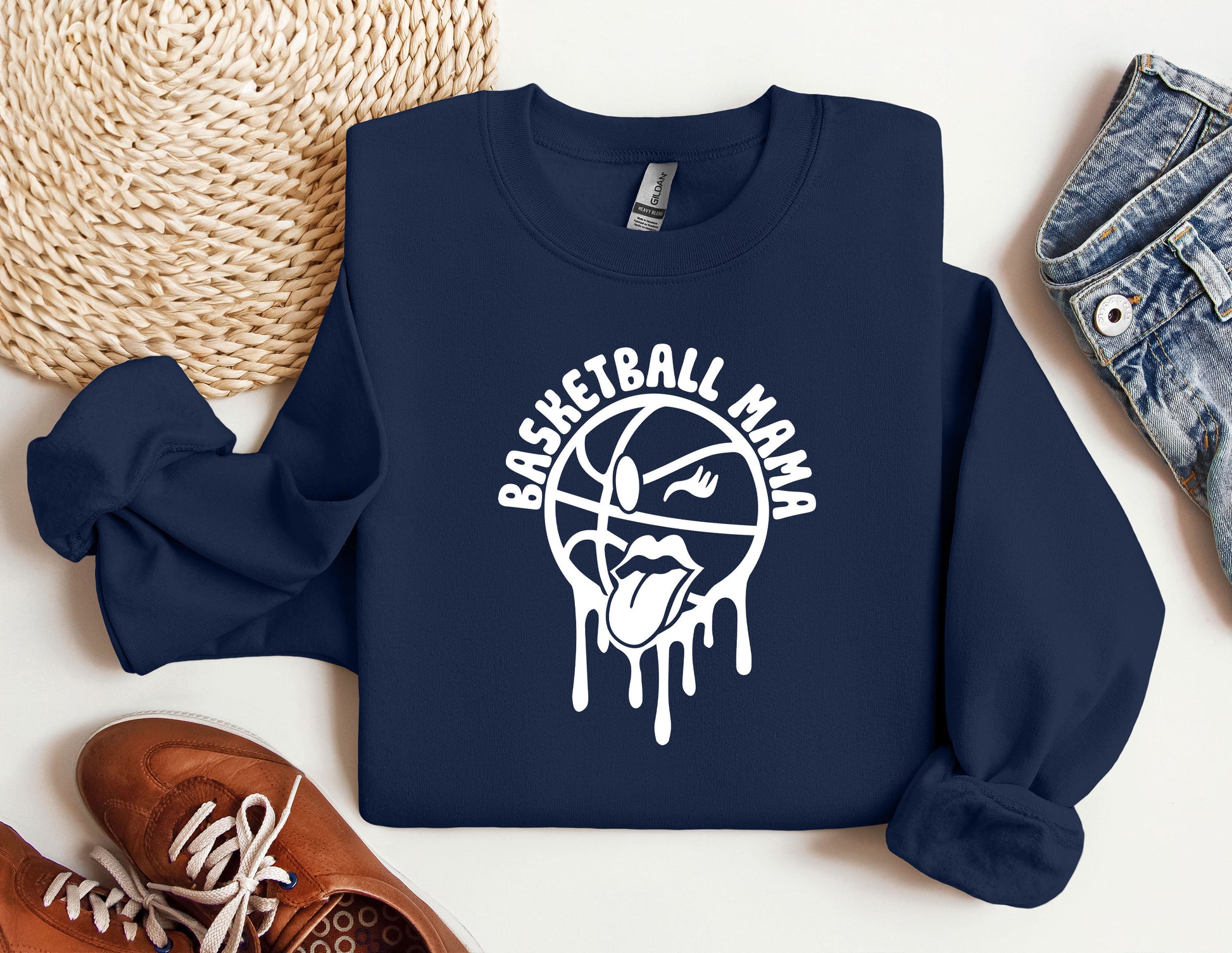 a blue sweatshirt with a basketball drawn on it