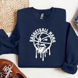 a blue sweatshirt with a basketball drawn on it