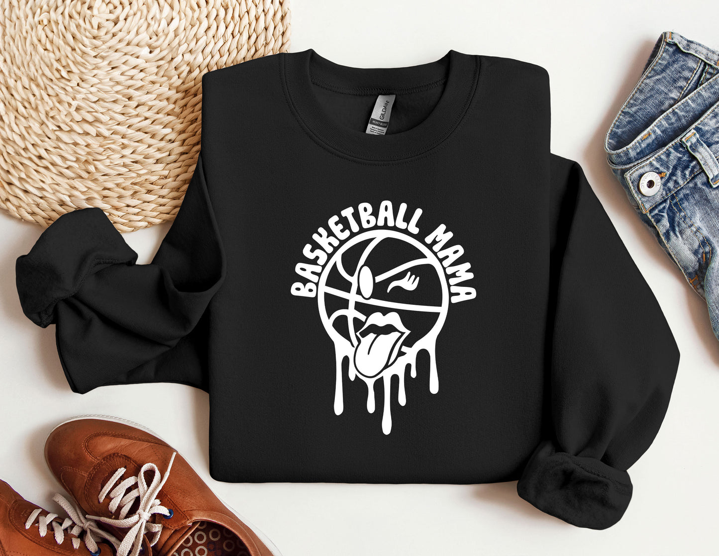 a black sweatshirt with a basketball drawn on it