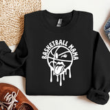 a black sweatshirt with a basketball drawn on it