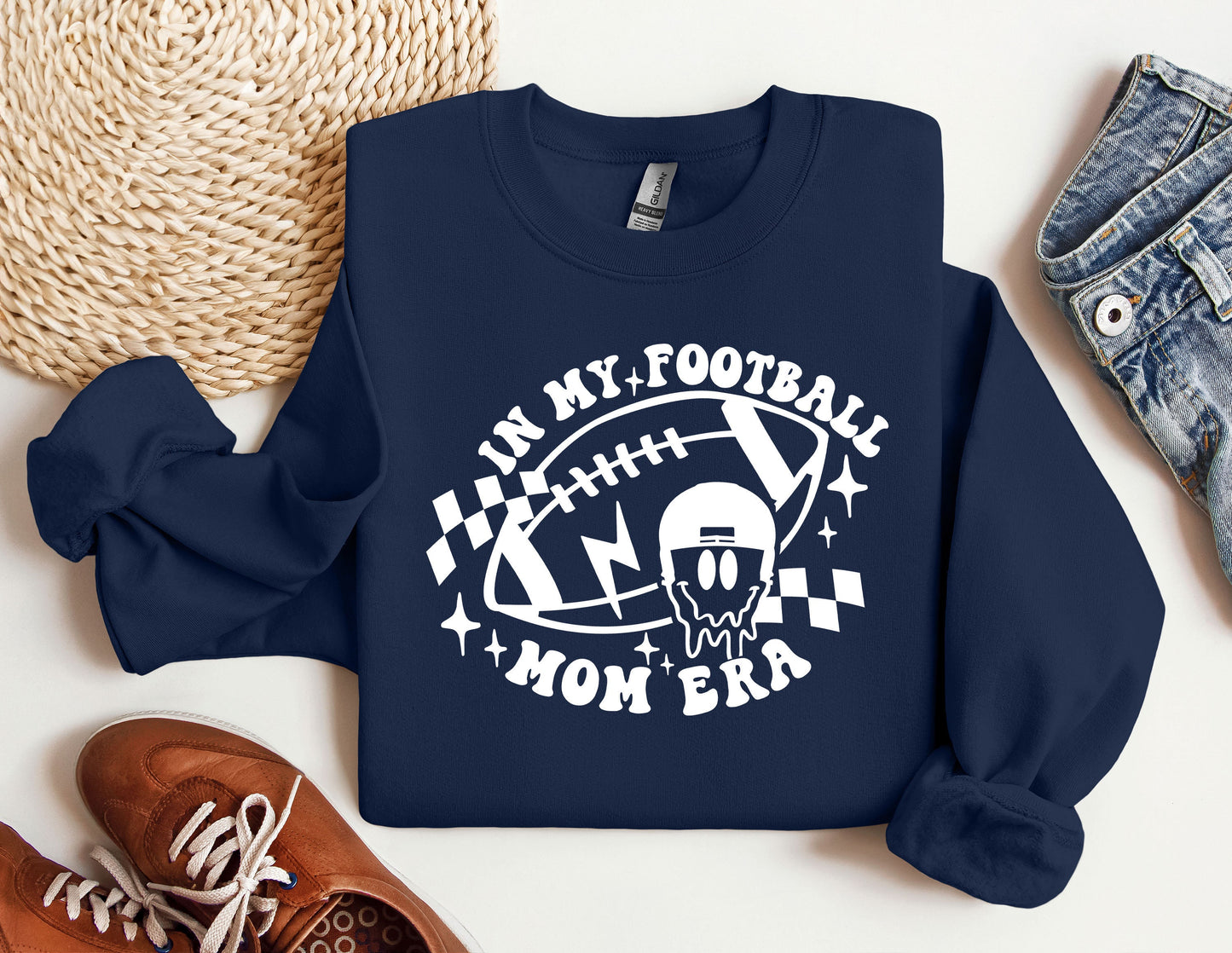 a sweatshirt with a football design on it