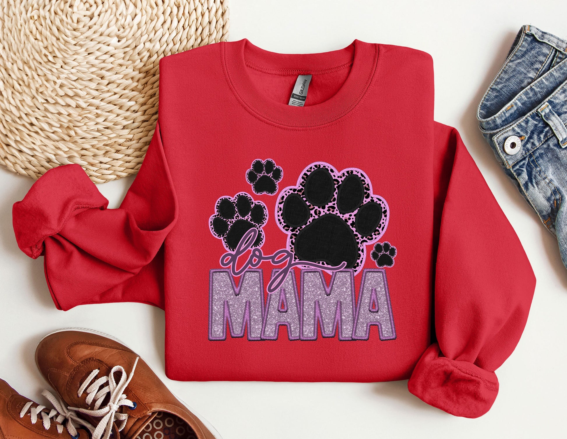 a red sweatshirt with the word mama printed on it