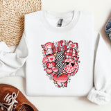 a pair of shoes and a sweater on a table