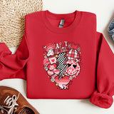 a red shirt with a heart and a pair of sneakers