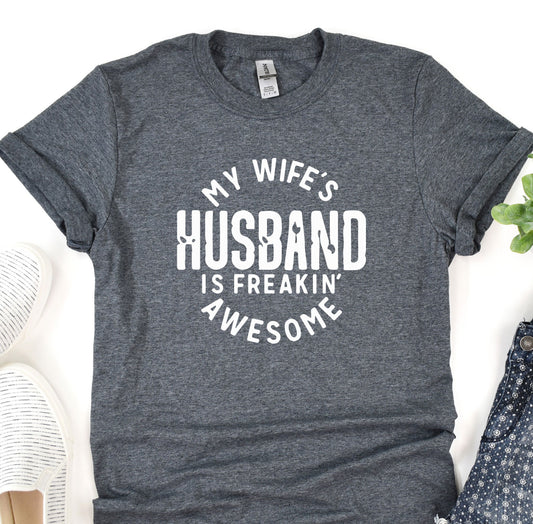 a t - shirt that says, my wife&#39;s husband is freakin &#39;