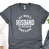 a t - shirt that says, my wife's husband is freakin '