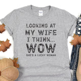 a t - shirt that says looking at my wife i think wow she's