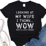 a t - shirt that says looking at my wife i think she's a