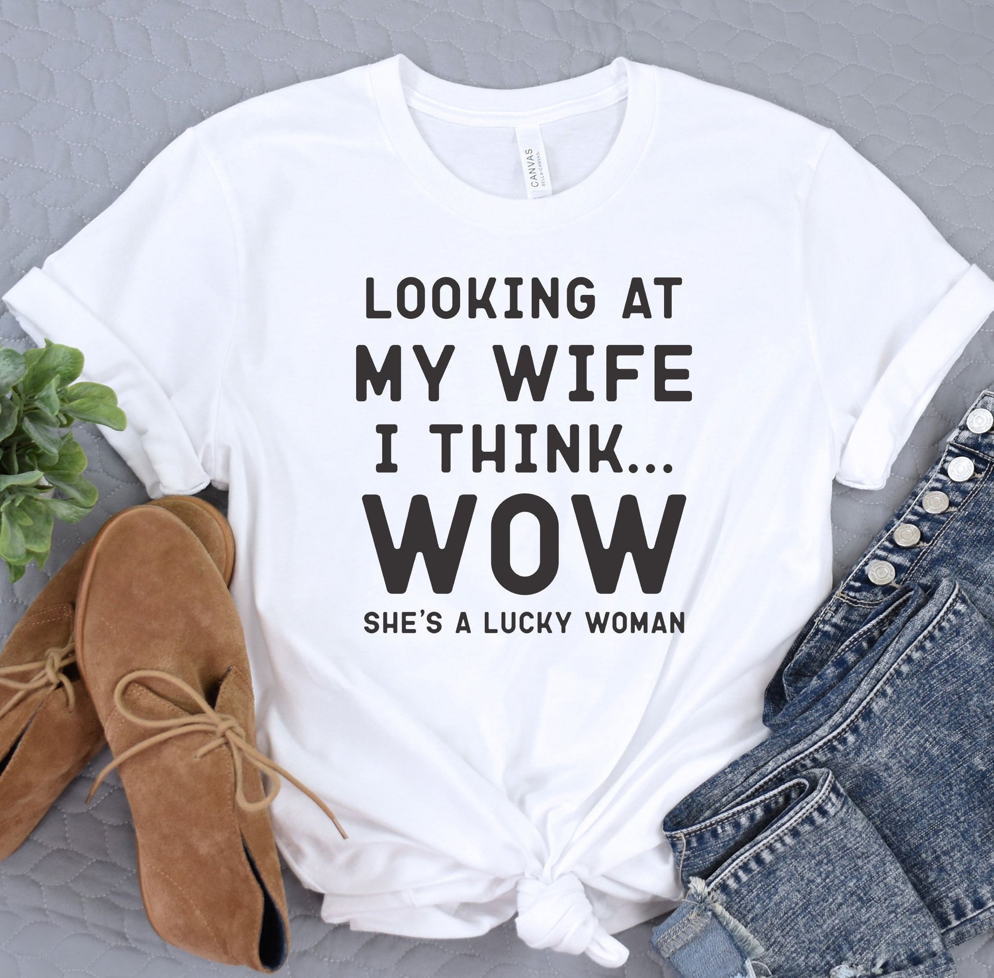 a t - shirt that says looking at my wife i think she&#39;s a