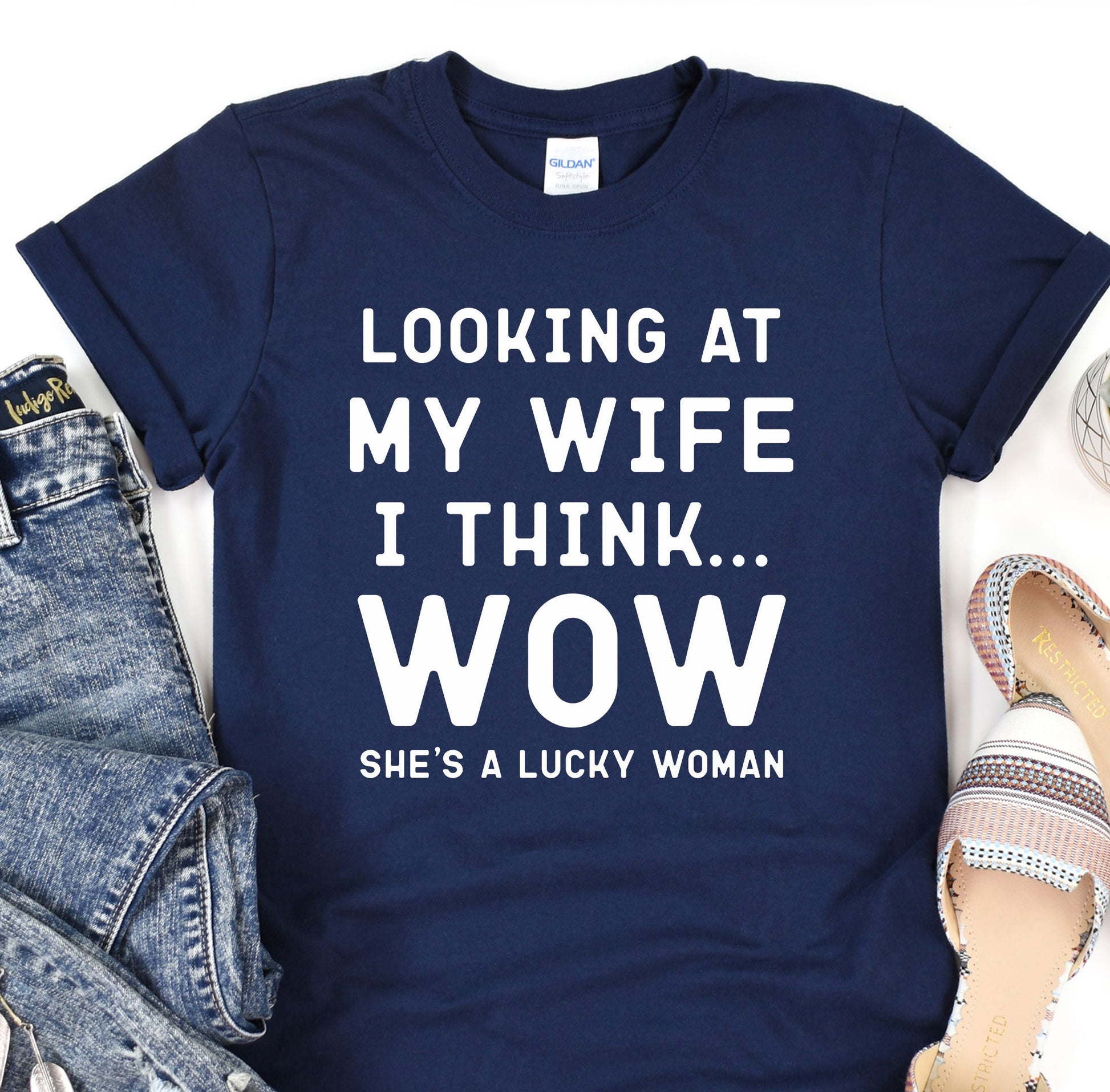 a t - shirt that says looking at my wife i think she&#39;s a