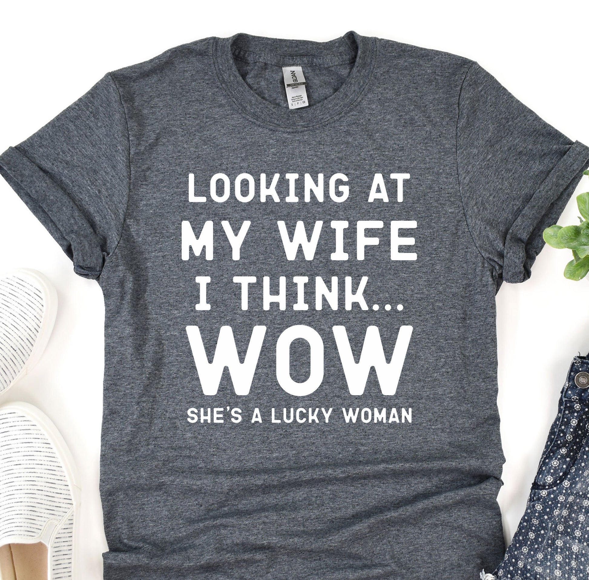 a t - shirt that says looking at my wife i think she&#39;s a