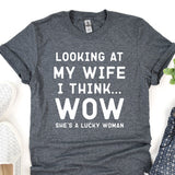 a t - shirt that says looking at my wife i think she's a