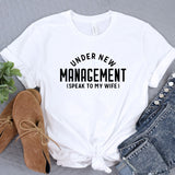a t - shirt that says under new management is speak to my wife