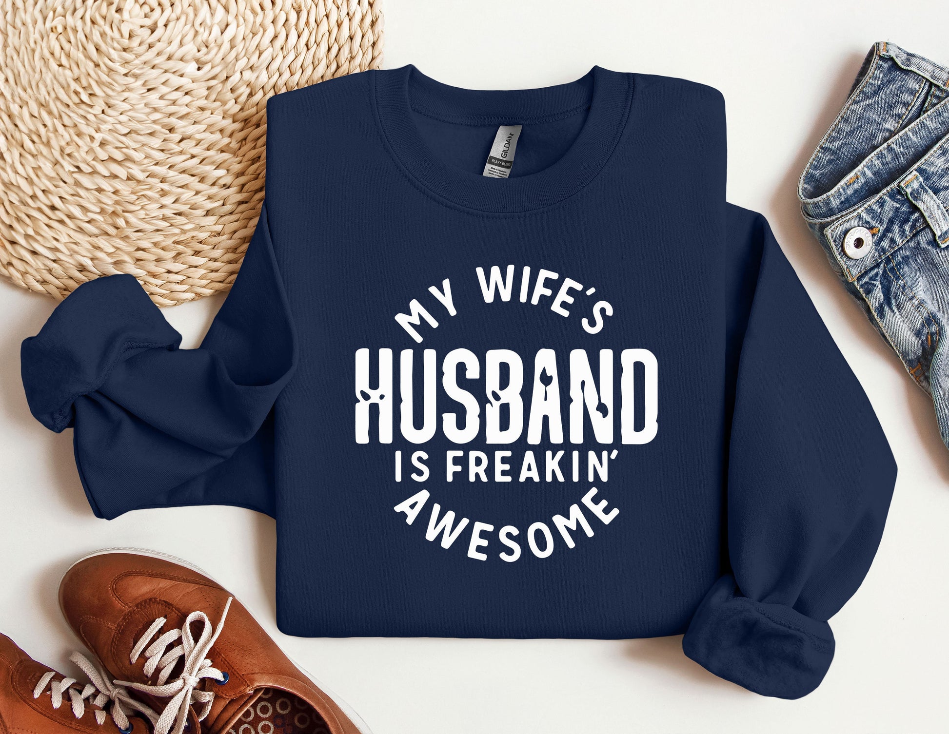 a sweatshirt that says, my wife&#39;s husband is freakin&#39;awesome