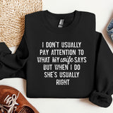 a black sweatshirt with a quote on it