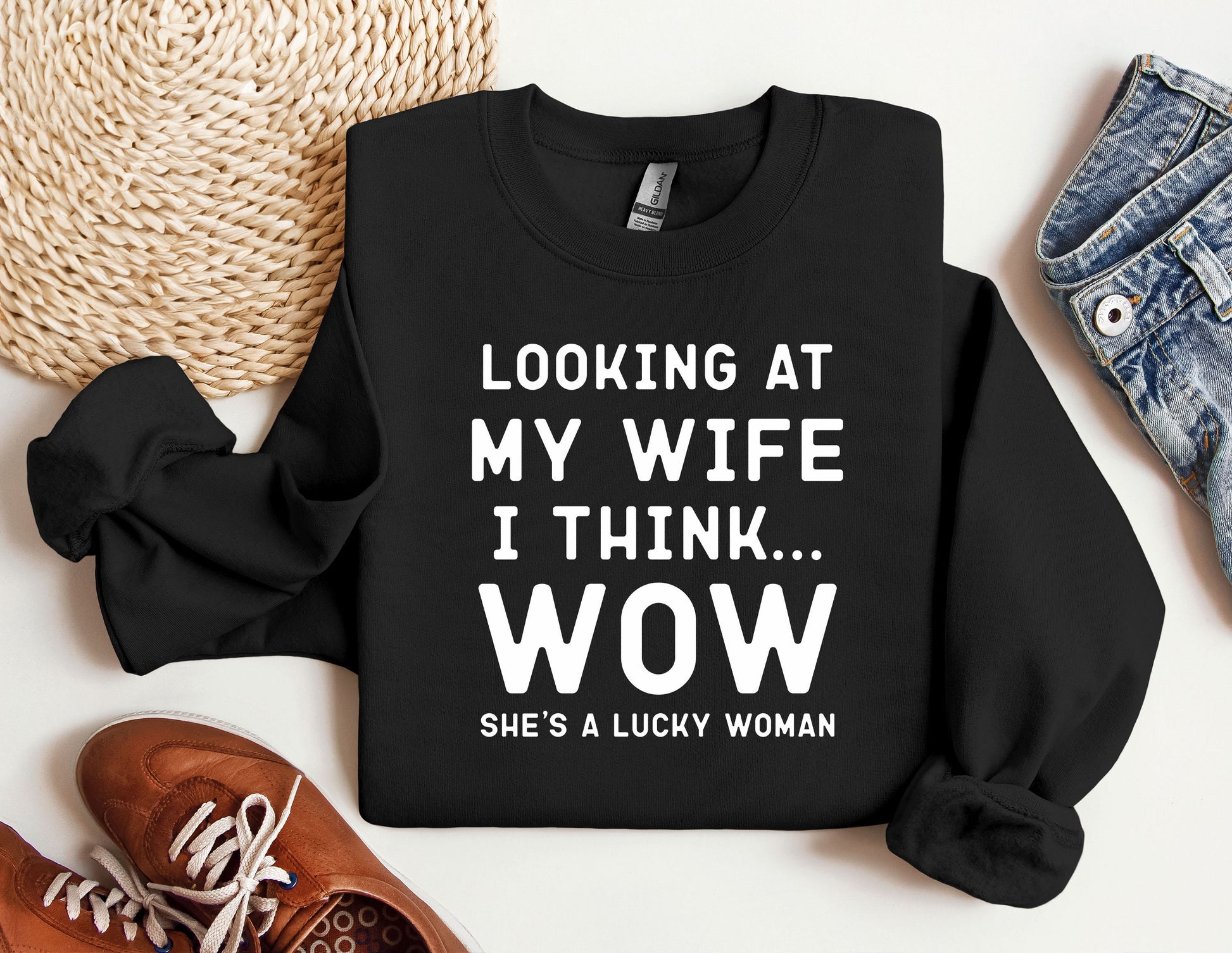 a black sweater with white writing on it
