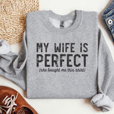 a sweater with the words my wife is perfect on it