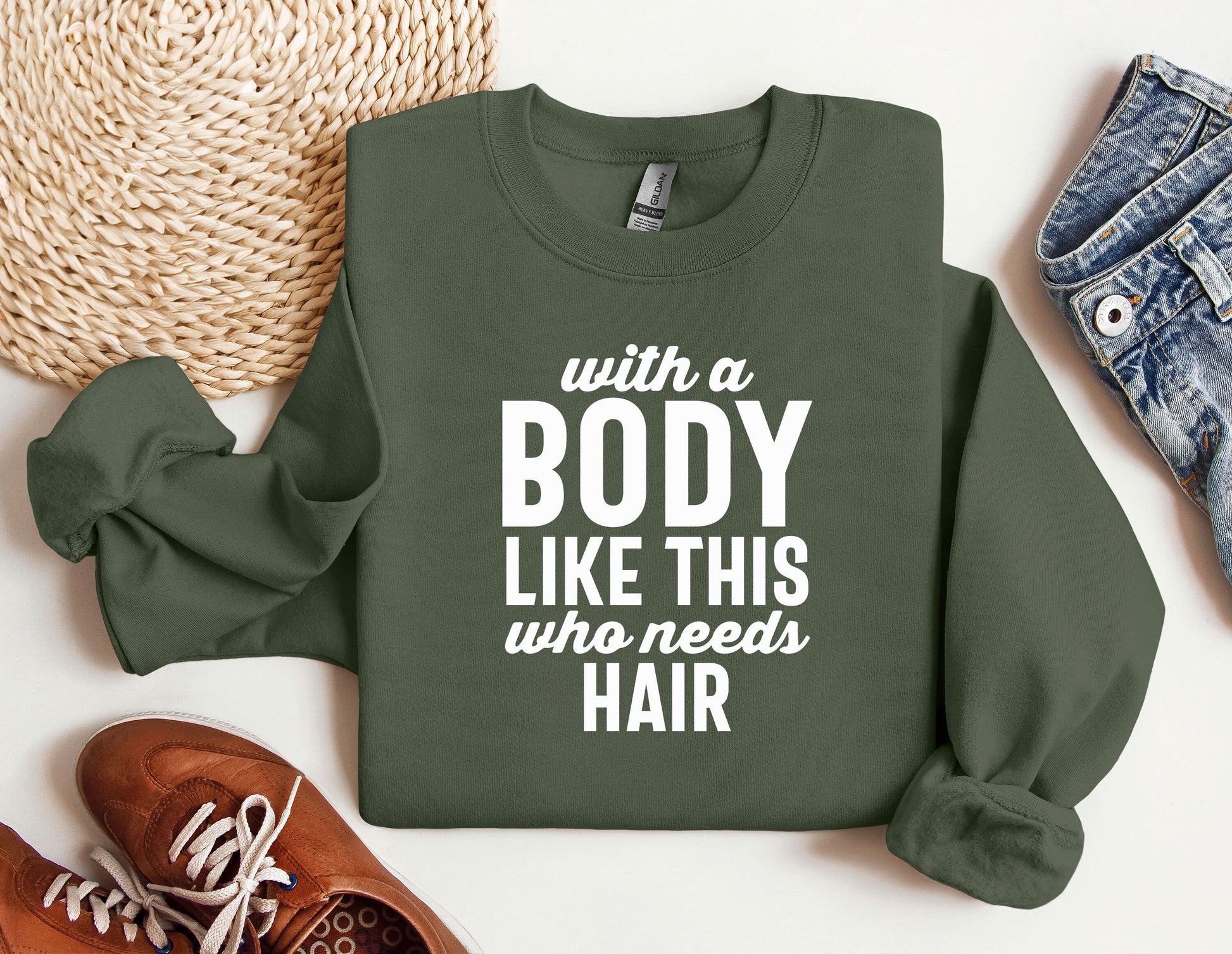 a sweatshirt that says, with a body like this who needs hair