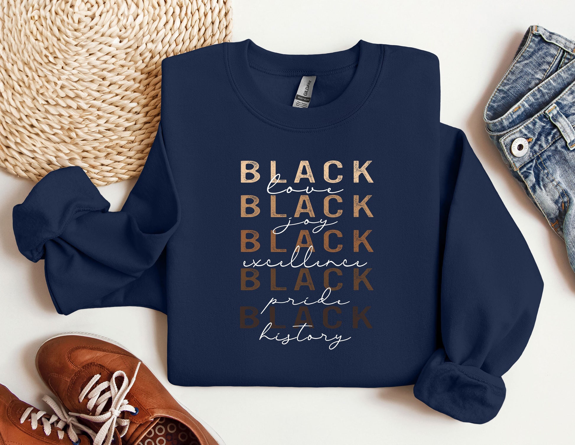 a blue sweatshirt with the words black on it