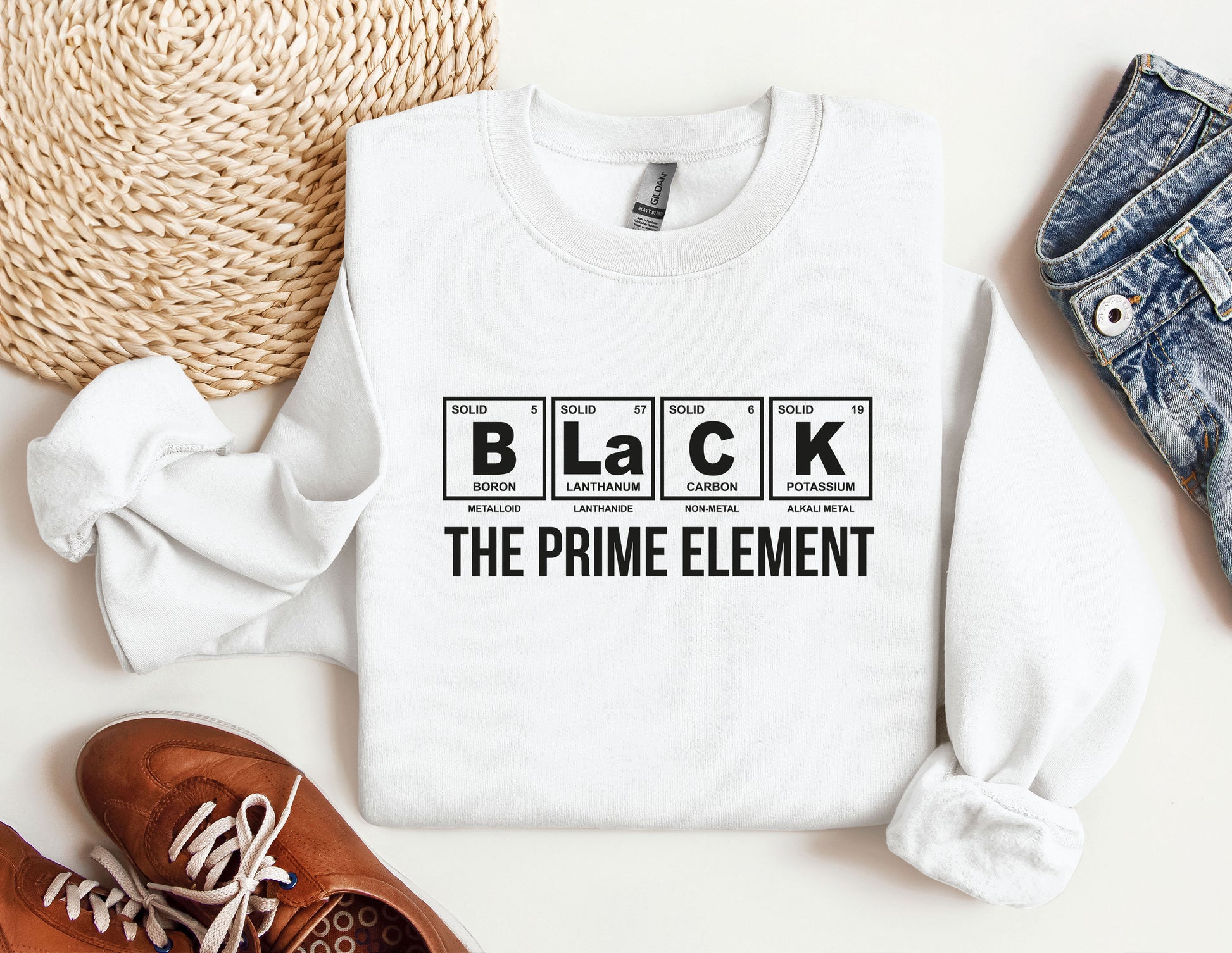 a white shirt that says black the prime element