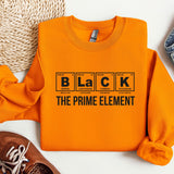 an orange shirt that says black the prime element