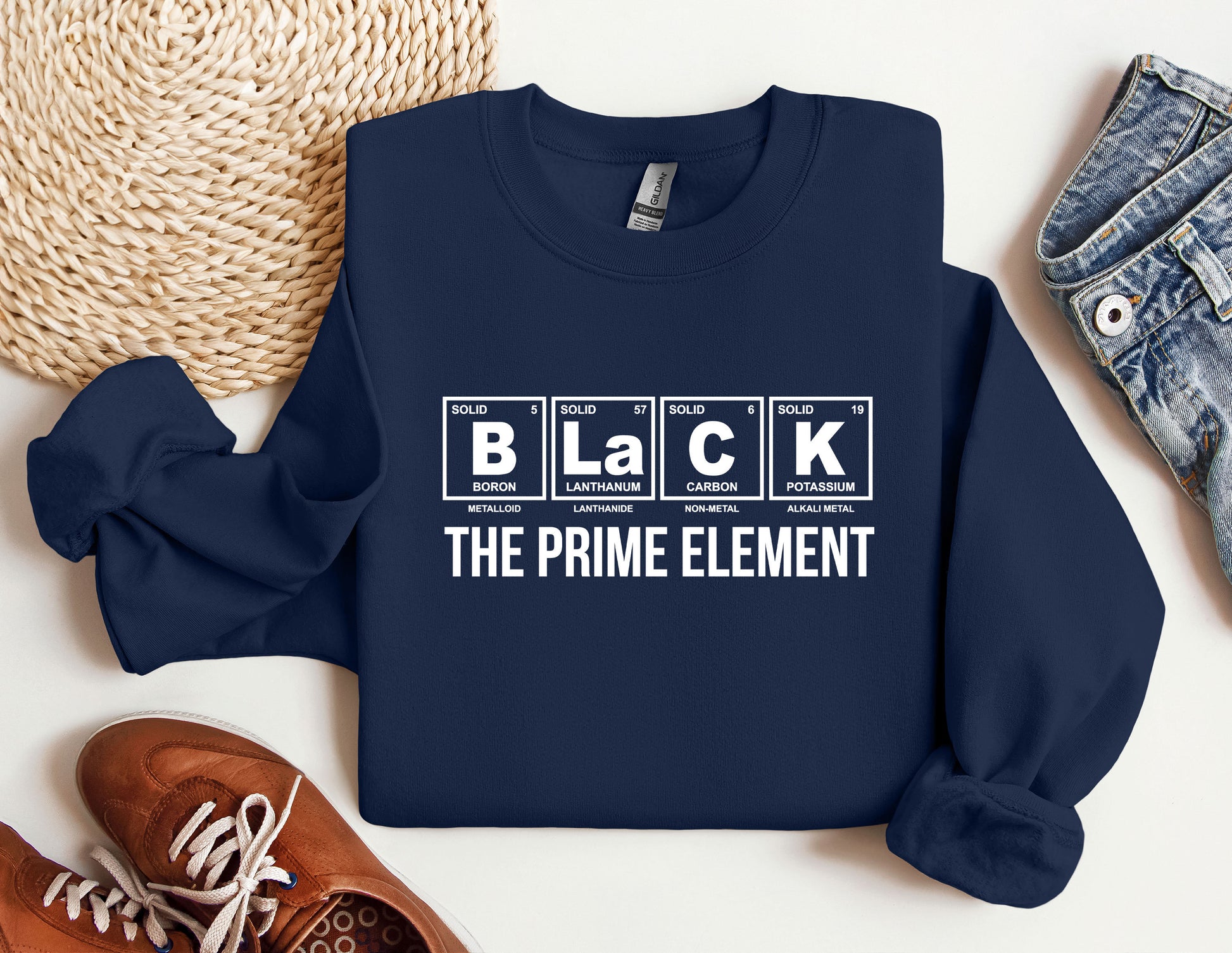 a blue sweatshirt that says black the prime element