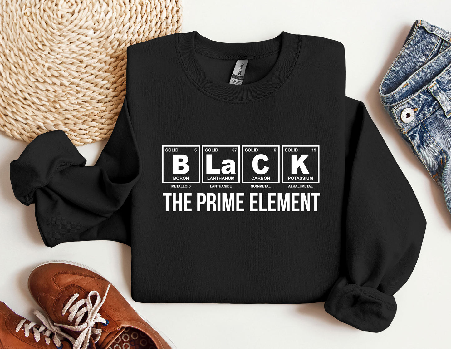 a black shirt that says black the prime element