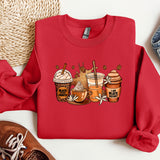 a red sweatshirt with a picture of two cups of coffee