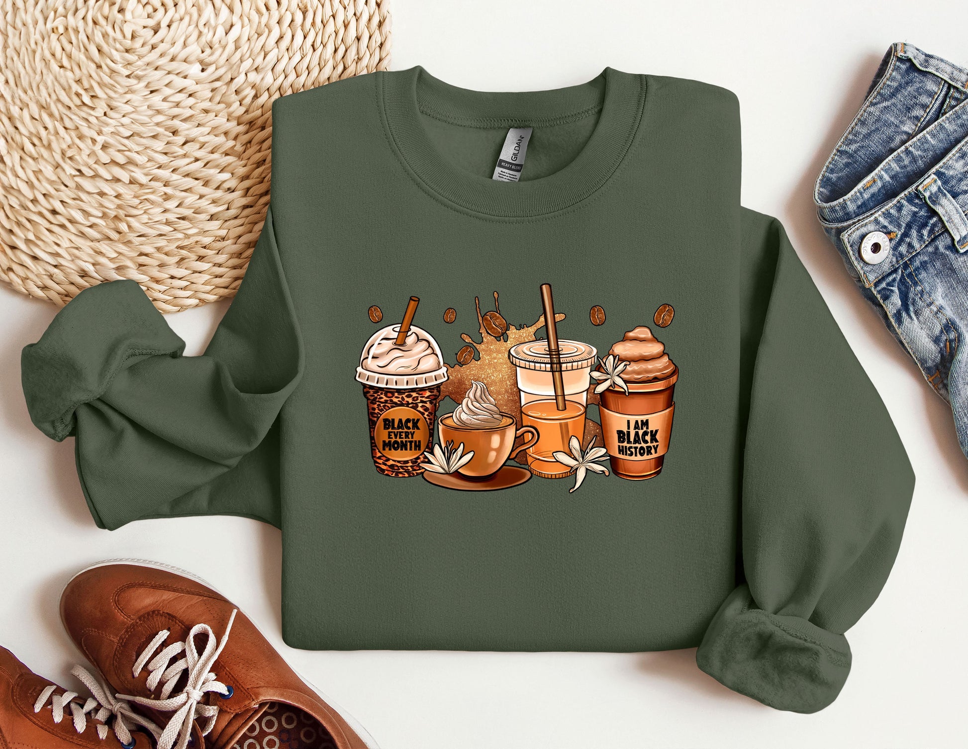 a green sweatshirt with a picture of coffee and ice cream