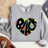 a sweater with the word back printed on it
