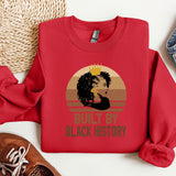 a red sweatshirt with a picture of a woman's face on it