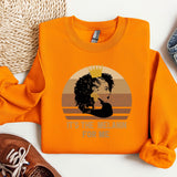 an orange shirt with a picture of a woman with a crown on it
