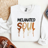 a white sweatshirt with the words melanited soul painted on it