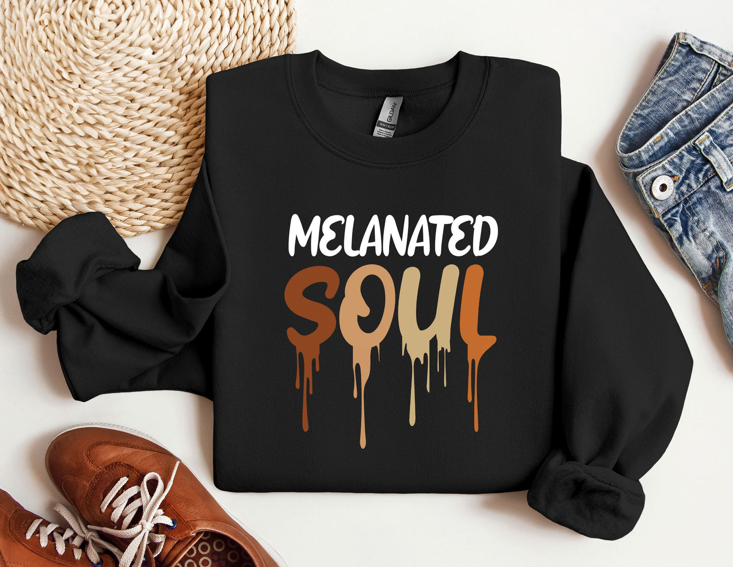 a black sweatshirt with the words melanited soul on it