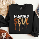a black sweatshirt with the words melanited soul on it