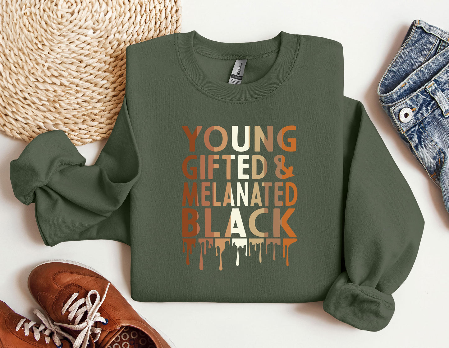 a green sweatshirt with the words young, life and related black on it