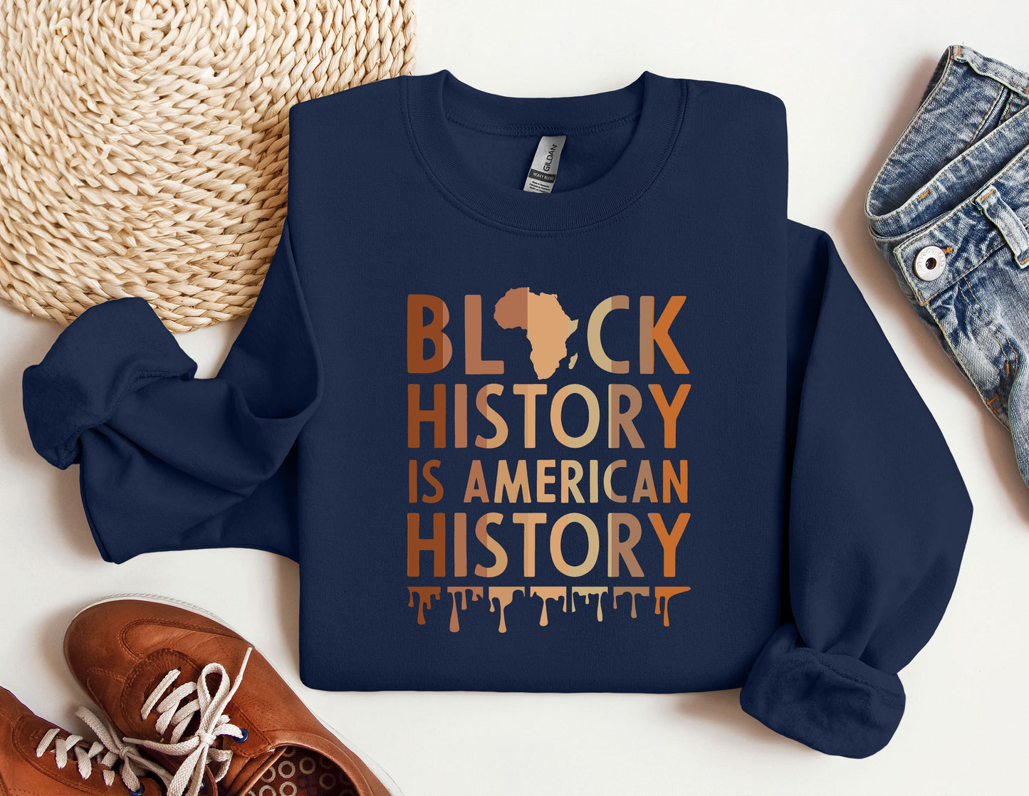 a blue sweatshirt with a black history is american history on it