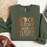 a green sweatshirt with the words black history is american history printed on it