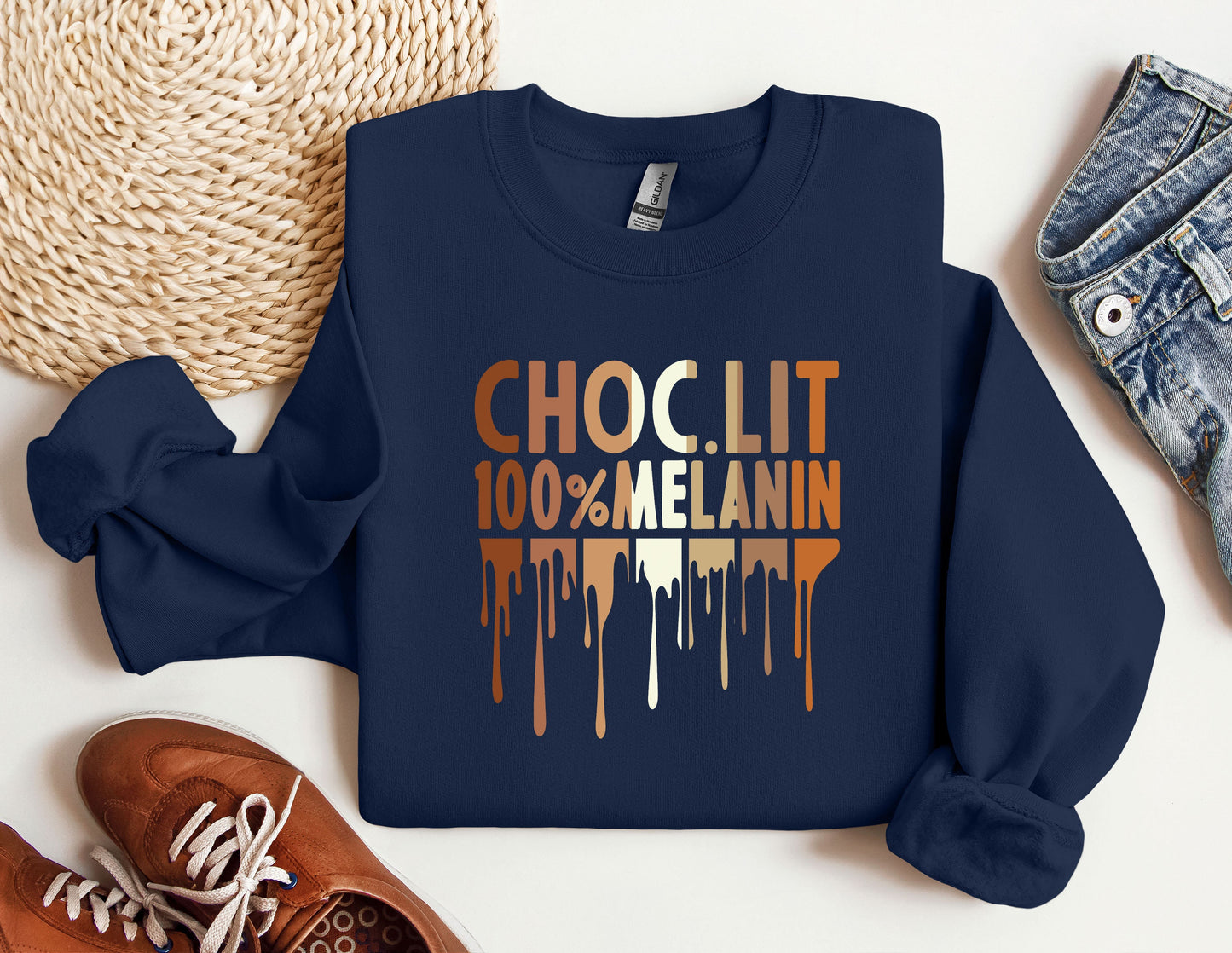 a blue sweatshirt with the words choclit 100 % melanin on it