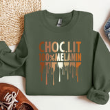 a green sweatshirt with the words choclit 10 % melanin on it