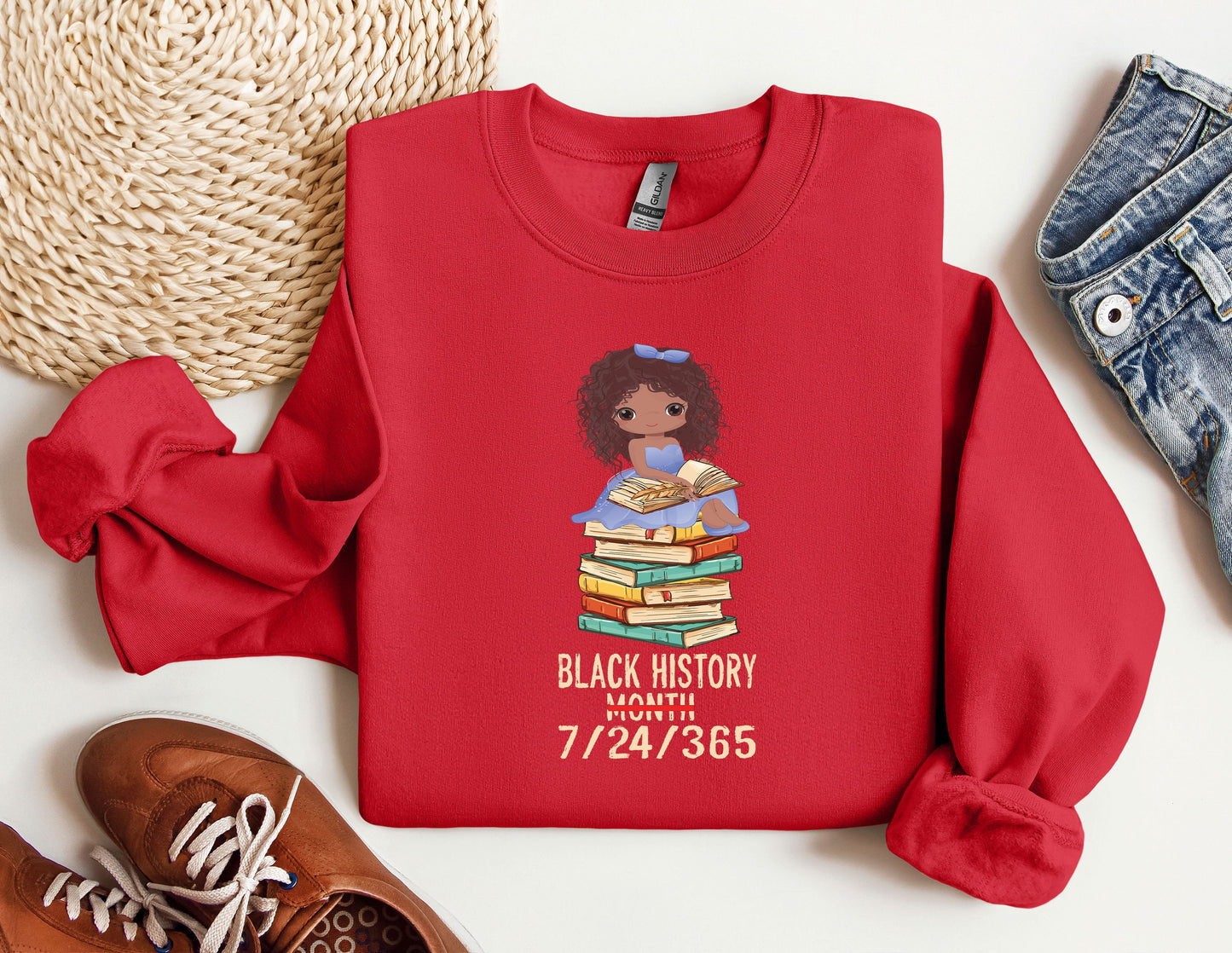 a red sweatshirt with a black history graphic on it