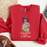 a red sweatshirt with a black history graphic on it