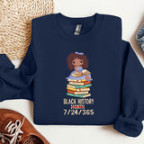 a blue sweatshirt with a black history month on it