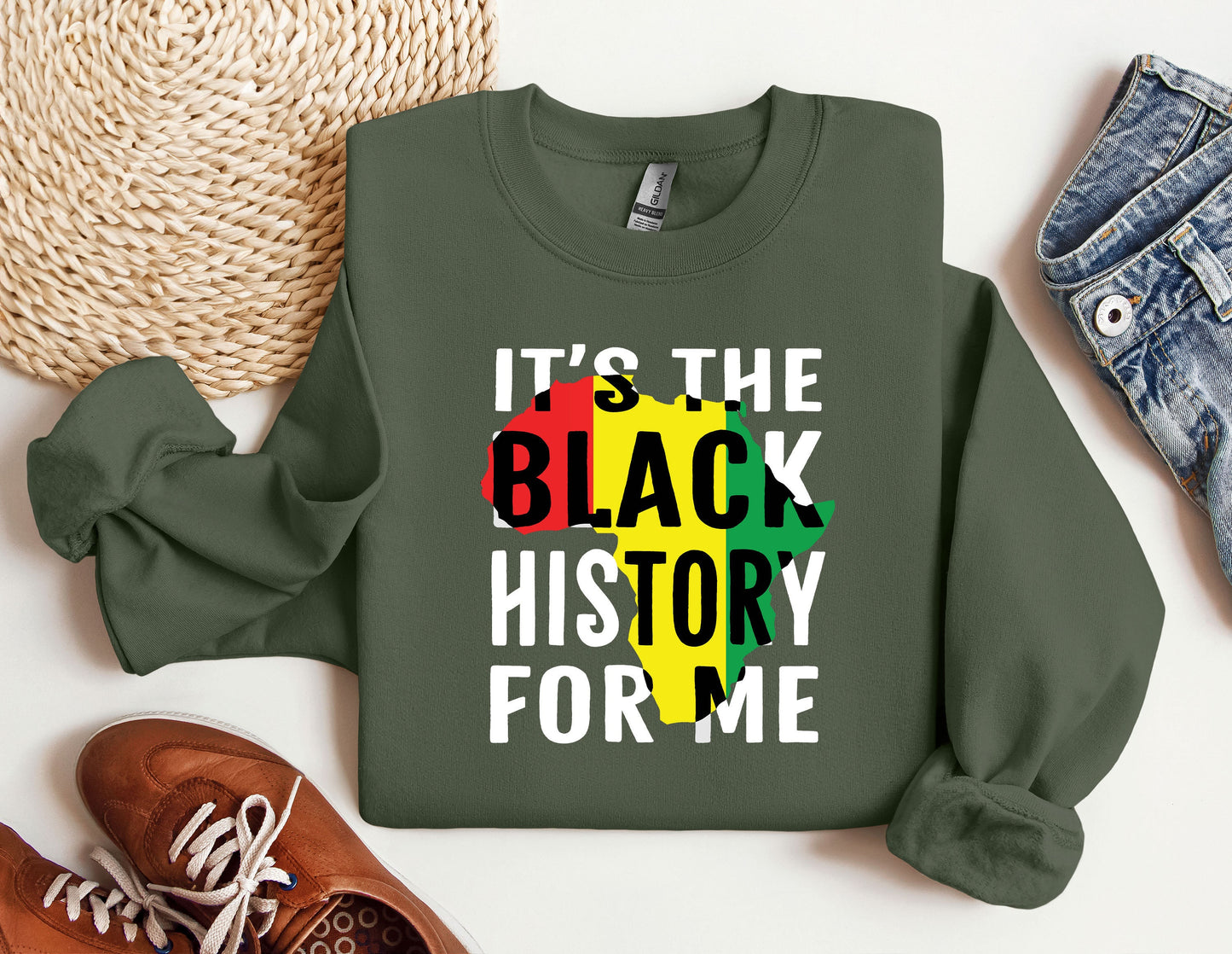 a green sweatshirt with the words it&#39;s the black history for me on it