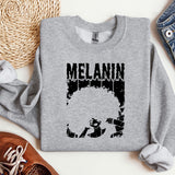 a sweatshirt with a picture of a man's face on it