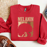 a red sweatshirt with the word melanin on it