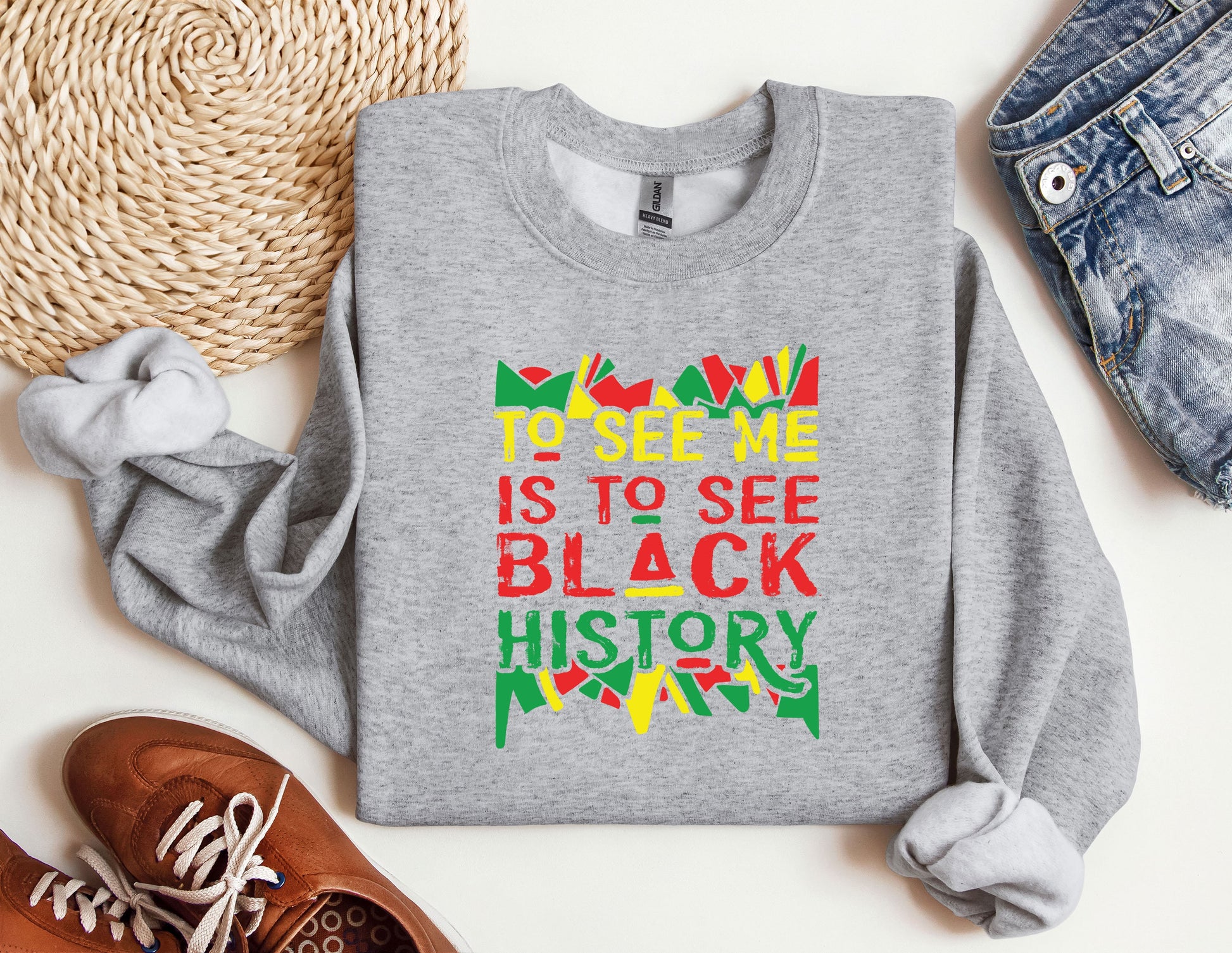 a sweatshirt that says to see me is to see black history