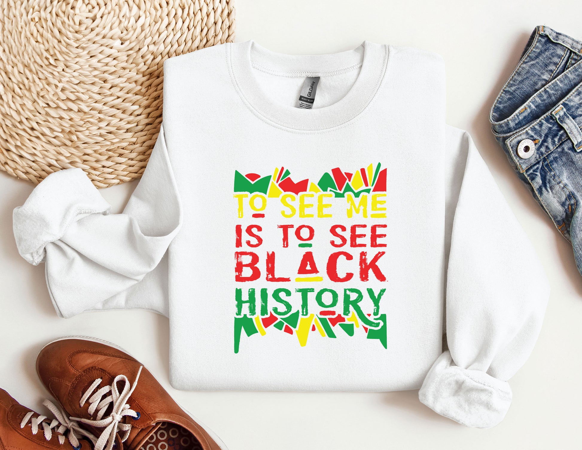 a white shirt with a colorful quote on it