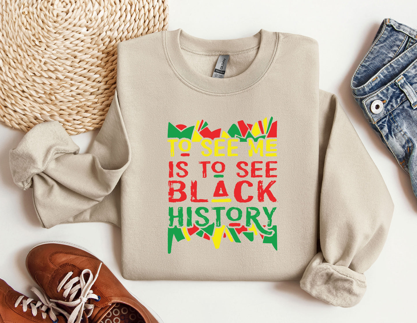 a sweater that says to see me is to see black history