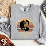 a sweater with a picture of a woman on it